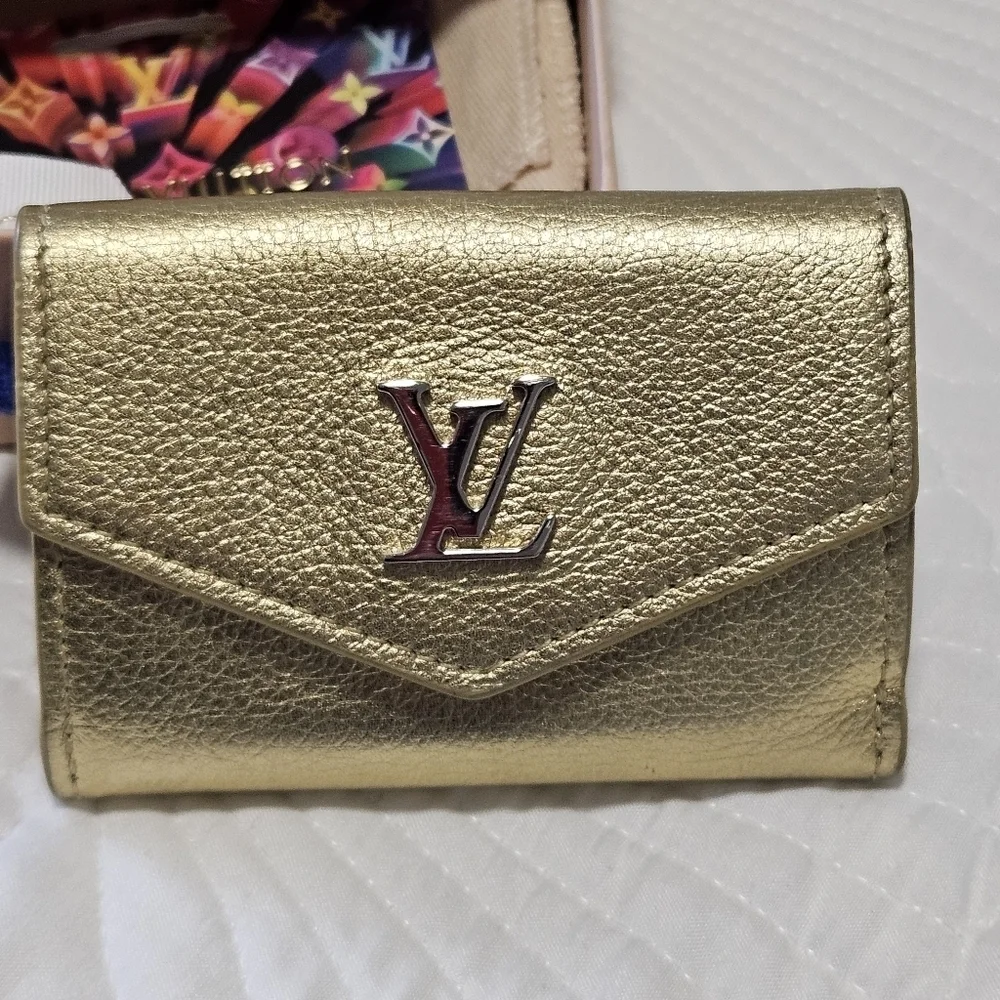 LOUIS VUITTON Portefeuille lock mini Compact Wallet Trifold Leather